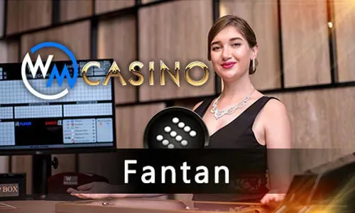 Live dealer at a baccarat table.